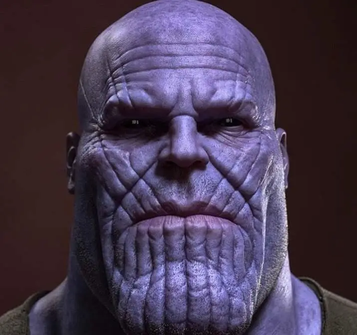 The character Thanos from the Marvel movies,he is weird looking with lots of lines on his face and a big head and small eyes. The character Thanos from the Marvel movies,he is weird looking with lots of lines on his face and a big head and small eyes.